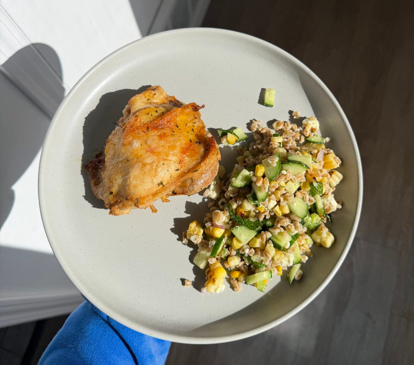 Lemon Herb Chicken Thighs with Grilled Corn, Farro, Mint, and Feta Salad